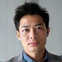 Portrait of Michael Chen, a serene meditation expert focused on urban stress relief.